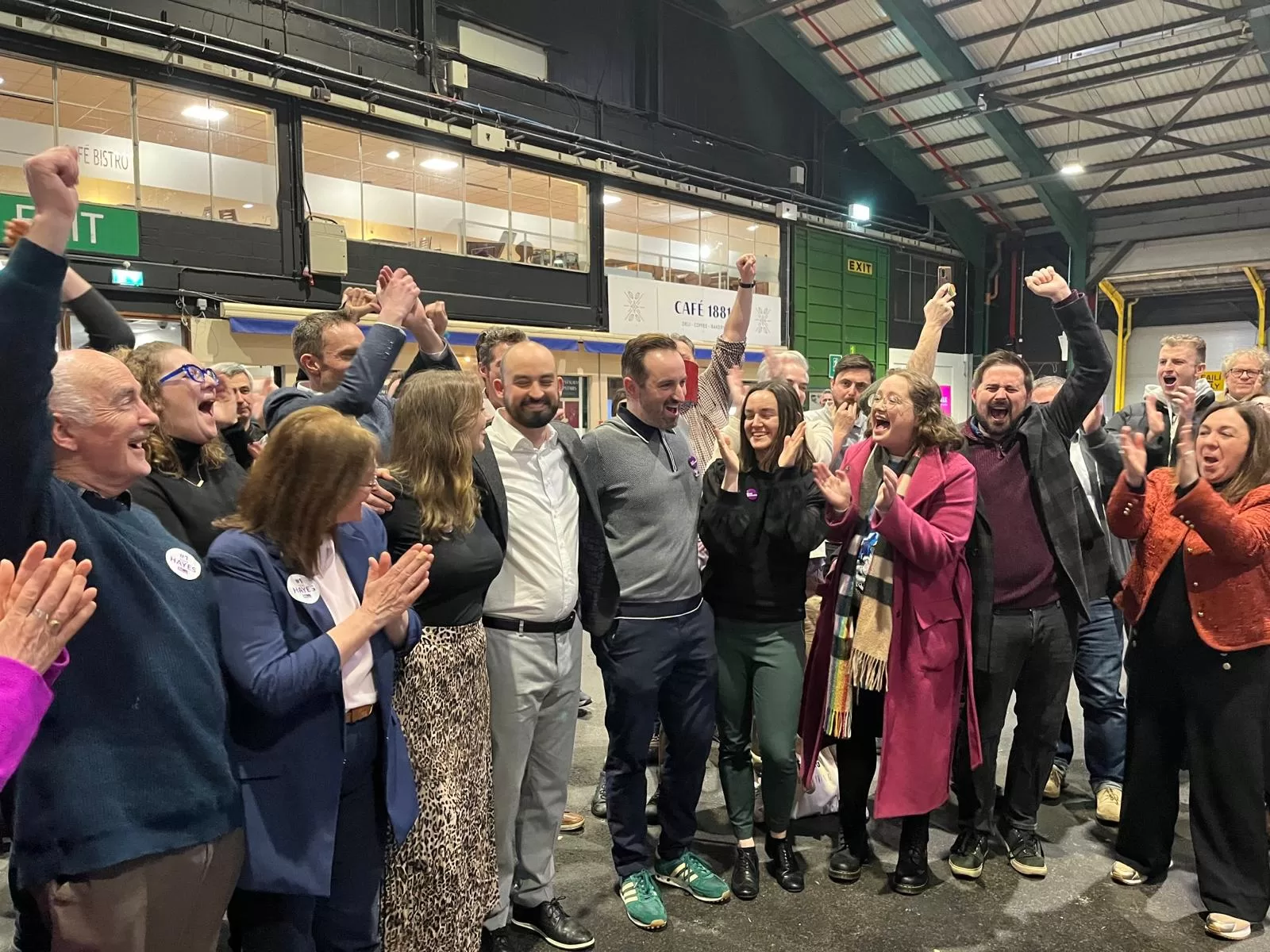 Eoin Hayes TD, his friends, family, and supporters cheering on his election at the RDS.